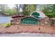 Community sign made of stone and landscaping reading 'The Overlook Timberline at Lake Lanier.' at 7675 Lanier View Rdg, Cumming, GA 30041