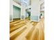 Light and bright hallway showing beautiful wood floors and neutral wall paint at 7675 Lanier View Rdg, Cumming, GA 30041