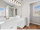 Bathroom with dual sinks, a large mirror, and a separate shower at 3317 Ridgemill Cir, Dacula, GA 30019
