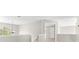 Open hallway with natural lighting and a view of the entry way at 3317 Ridgemill Cir, Dacula, GA 30019