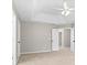 Spacious main bedroom features neutral carpet and ample natural light at 3317 Ridgemill Cir, Dacula, GA 30019
