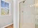 Bright bathroom with a stand-alone shower at 3317 Ridgemill Cir, Dacula, GA 30019