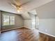 Bedroom featuring hardwood floors, neutral walls, and natural light at 1004 Westminister Ct, Woodstock, GA 30188