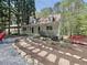 Inviting home featuring a front porch, walkway landscaping, and beautiful yard at 1004 Westminister Ct, Woodstock, GA 30188