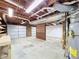 This garage has room for two cars and features a workbench space at 1004 Westminister Ct, Woodstock, GA 30188