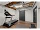 Home exercise room featuring a treadmill, and natural light at 202 Carrington Estates Ct, Woodstock, GA 30188