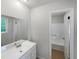 Bathroom featuring a single vanity sink and shower and tub combo at 2390 Century Ln, Snellville, GA 30039