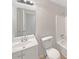 Bathroom featuring a vanity sink, toilet, and shower-tub combo at 2390 Century Ln, Snellville, GA 30039