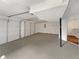 Large garage featuring two garage doors and painted floor at 2390 Century Ln, Snellville, GA 30039