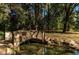Picturesque stone bridge with natural surroundings reflects a serene and beautiful setting at 2479 Ne Peachtree Ne Rd # 1112, Atlanta, GA 30305