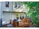 Back deck with access to home, exterior features multiple windows, with trees in the backyard at 3365 Vintage Se Cir, Smyrna, GA 30080