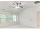 Bedroom with natural light coming in from the windows, neutral colored carpet, and a ceiling fan at 3365 Vintage Se Cir, Smyrna, GA 30080