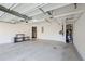 Spacious garage featuring overhead storage racks and ample room for parking at 3365 Vintage Se Cir, Smyrna, GA 30080