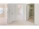 Hallway with doorways leading to a bedroom, walk-in closet, and other rooms in the home at 3365 Vintage Se Cir, Smyrna, GA 30080