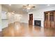 A spacious living room with hardwood floors, fireplace, and built-in shelving units at 3365 Vintage Se Cir, Smyrna, GA 30080