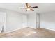 Bedroom with a ceiling fan, carpet, and two closets at 3839 Rosedale Ln, Douglasville, GA 30135