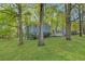 Inviting two-story home nestled among mature trees in a lush, green yard at 3839 Rosedale Ln, Douglasville, GA 30135