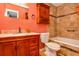 Bathroom featuring tile flooring, a toilet, a vanity, a sink, and a bathtub at 484 Aberdeen Dr, Stonecrest, GA 30083