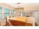 Kitchen island with butcher block top complemented by light fixture and breakfast area overlooking living spaces at 484 Aberdeen Dr, Stonecrest, GA 30083