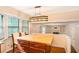 Bright kitchen with a unique center island, wooden cabinets, modern lighting and a view to the Gathering room at 484 Aberdeen Dr, Stonecrest, GA 30083