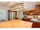 Well-lit kitchen featuring stainless steel appliances, cherry cabinets, and a central island with ample counter space at 484 Aberdeen Dr, Stonecrest, GA 30083