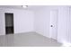 Bright room with tile flooring, white walls, a door, and a closet at 110 Ridge Se Ct, Mableton, GA 30126