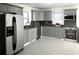 This updated kitchen boasts stainless steel appliances, subway tile backsplash, and plenty of counter space at 110 Ridge Se Ct, Mableton, GA 30126