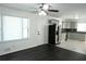 Bright living room featuring hardwood floors and access to the updated kitchen at 110 Ridge Se Ct, Mableton, GA 30126
