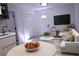 Inviting living room featuring neutral decor, modern furnishings, and seamless flow into the adjacent kitchen at 110 Ridge Se Ct, Mableton, GA 30126