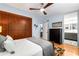 Relaxing bedroom with ensuite bathroom access, complete with wood floors, ceiling fan and modern decor at 2002 Cedar Chase Ne Ln, Atlanta, GA 30324