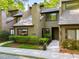 Exterior of a charming townhouse featuring lovely landscaping and architectural details at 2002 Cedar Chase Ne Ln, Atlanta, GA 30324