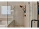 Bathroom featuring walk-in shower, glass door and bronze fixtures at 3003 Evanshire Ave, Duluth, GA 30096