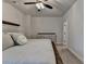 Bedroom featuring neutral paint, carpeted floor, large windows, ceiling fan, and a bed at 3003 Evanshire Ave, Duluth, GA 30096