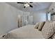 Inviting bedroom featuring a ceiling fan and neutral decor for a relaxing retreat at 3003 Evanshire Ave, Duluth, GA 30096