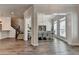 Charming dining room area featuring wood floors, stylish furnishings, and a view of the staircase at 3003 Evanshire Ave, Duluth, GA 30096