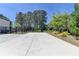 Long driveway leads to a detached garage at 3003 Evanshire Ave, Duluth, GA 30096