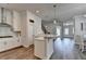Modern kitchen features stainless steel appliances, a stylish island, and an open layout at 3003 Evanshire Ave, Duluth, GA 30096