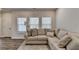 Inviting living room with hardwood floors, abundant natural light, and comfortable seating at 3003 Evanshire Ave, Duluth, GA 30096