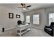 Home office featuring great natural light, modern ceiling fan, desk, and comfortable seating at 3003 Evanshire Ave, Duluth, GA 30096