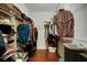 Large walk-in closet with built-in shelving, hanging rods, and ample storage space at 3215 Trowbridge Dr, Cumming, GA 30040