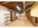 Unfinished basement with exposed ductwork and storage at 4350 Bonaparte Dr, Tucker, GA 30084