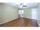 Cozy bedroom with hardwood floors, ample natural light, and neutral wall colors at 4350 Bonaparte Dr, Tucker, GA 30084