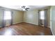 Bright bedroom featuring beautiful hardwood floors and natural lighting at 4350 Bonaparte Dr, Tucker, GA 30084