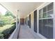 Charming front porch with classic railings and view of the landscaped front yard at 4350 Bonaparte Dr, Tucker, GA 30084