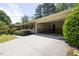 Spacious driveway leading up to a two car garage and well landscaped exterior at 4350 Bonaparte Dr, Tucker, GA 30084