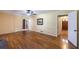 Spacious living room with hardwood floors and multiple entryways at 4350 Bonaparte Dr, Tucker, GA 30084