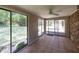 Bright sunroom featuring tile flooring and sliding glass doors at 4350 Bonaparte Dr, Tucker, GA 30084