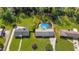 Sprawling property featuring a large in-ground pool, deck, and lush landscaping at 1834 Kimberly Sw Dr, Marietta, GA 30008