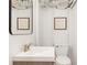 Cozy powder room with a vessel sink, mirror, and updated fixtures at 1834 Kimberly Sw Dr, Marietta, GA 30008