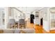 Bright kitchen showcasing a breakfast bar with seating and hardwood flooring at 1834 Kimberly Sw Dr, Marietta, GA 30008